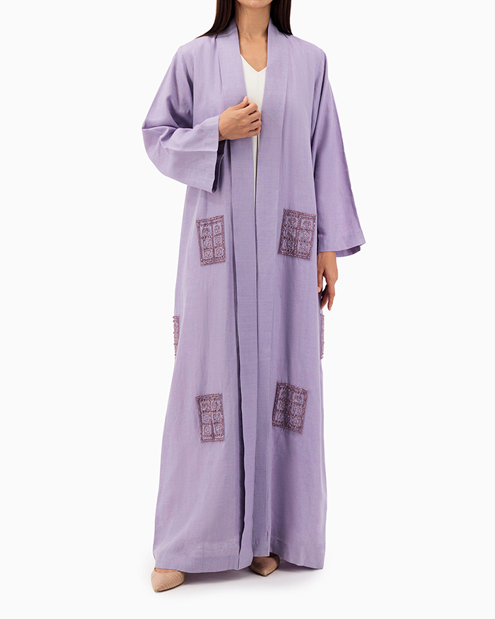 Model wears Purple Linen Abaya