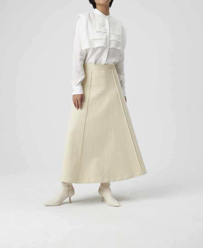 Model wears Off White Skirt