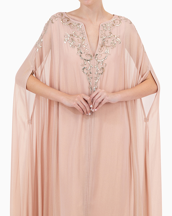 Model wears Pink V Neck Kaftan